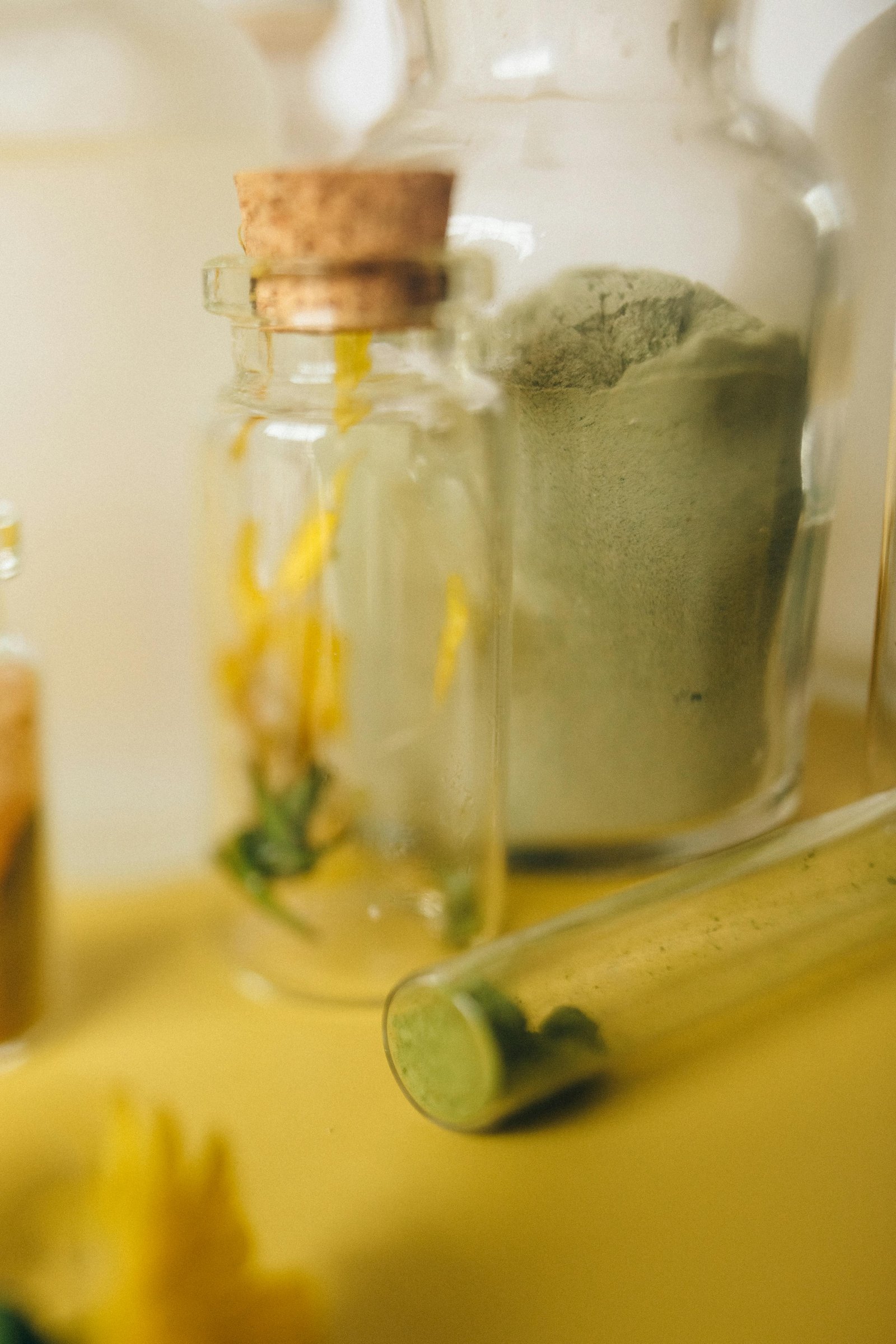 Botanical powder in glass formulation containers